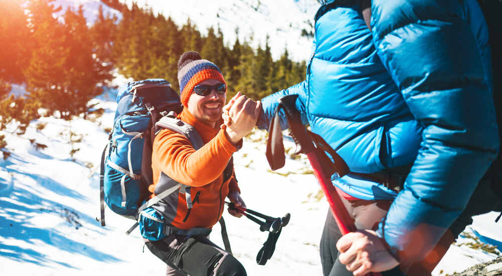 Climbers hiking in the snow