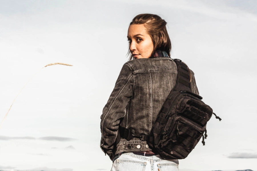 Woman on an adventure in the woods with a crossbody bag